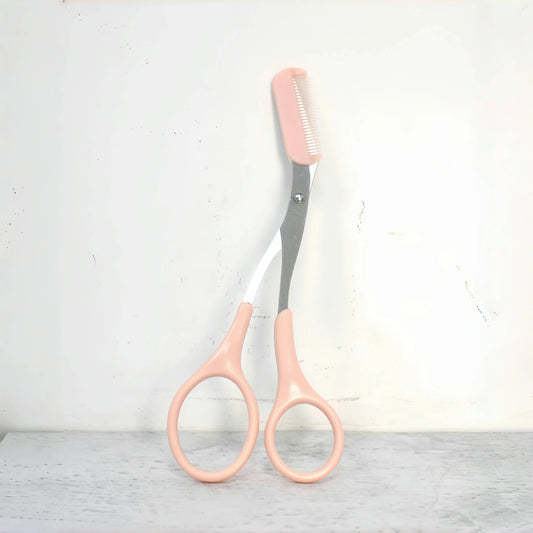 Pink eyebrow trimming scissors with built-in comb - stainless steel, precise grooming tool, creating perfect eyebrows